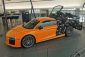 Audi R8 Disintegration orange - Une œuvre d'art montrant les dessous du moteur V10